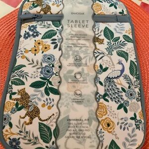 ENVOGUE tablet sleeve fits most 9x11 iPad Air, pro, galaxy tablets. 100% poly.